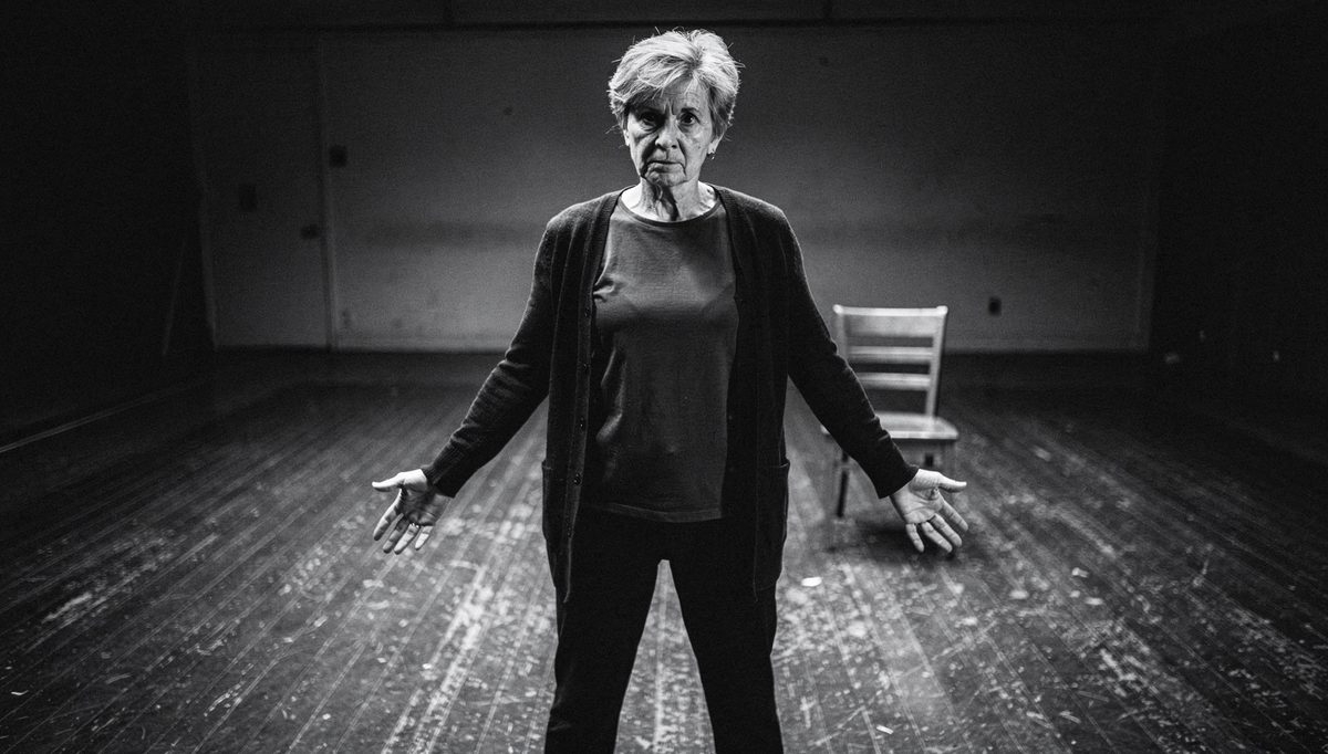 Woman rehearsing physical expression stance before high-stakes talk
