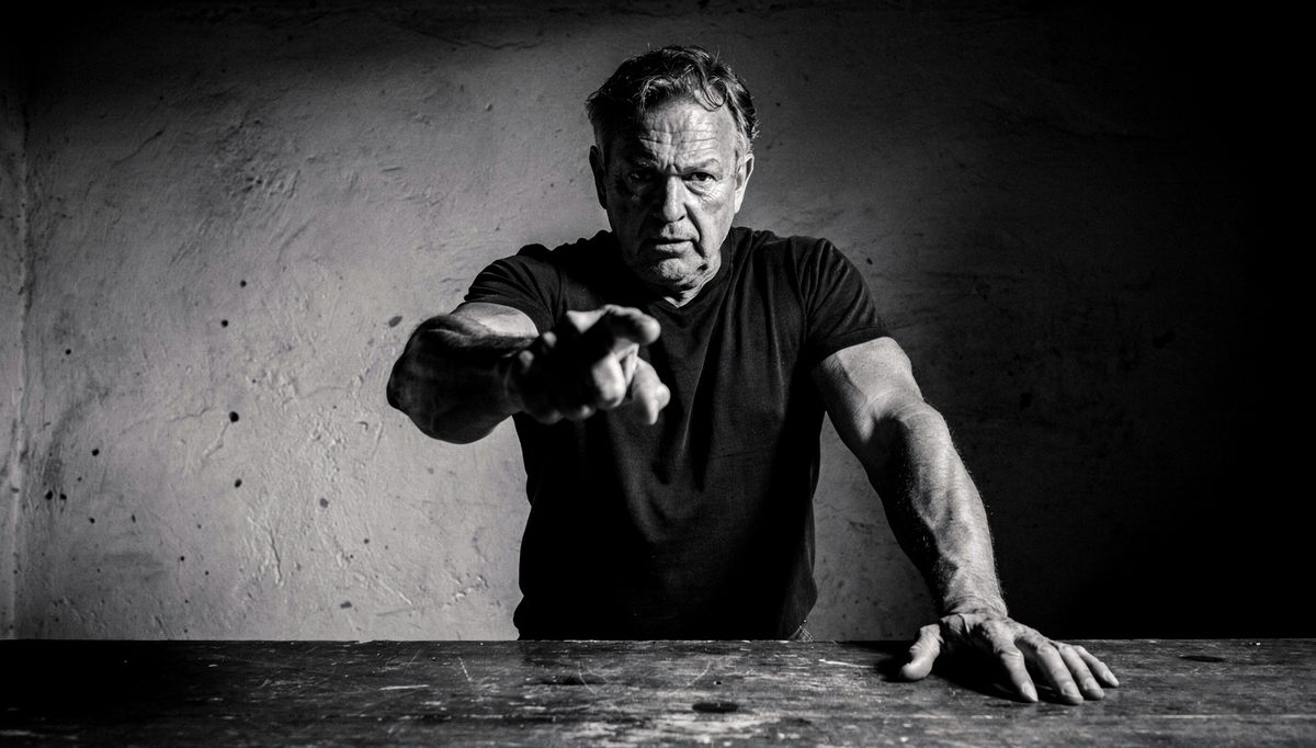 Man using deliberate gesture, demonstrating physical expression skills