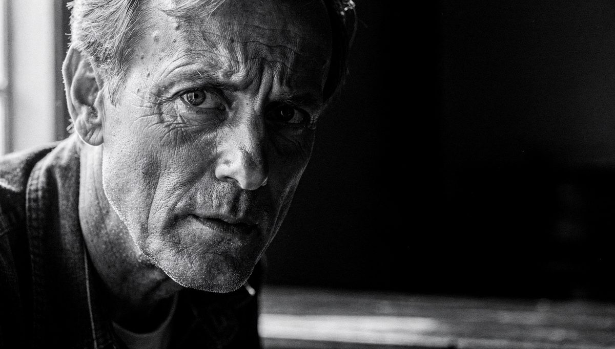 Man with direct eye contact honesty gaze in conversation close-up